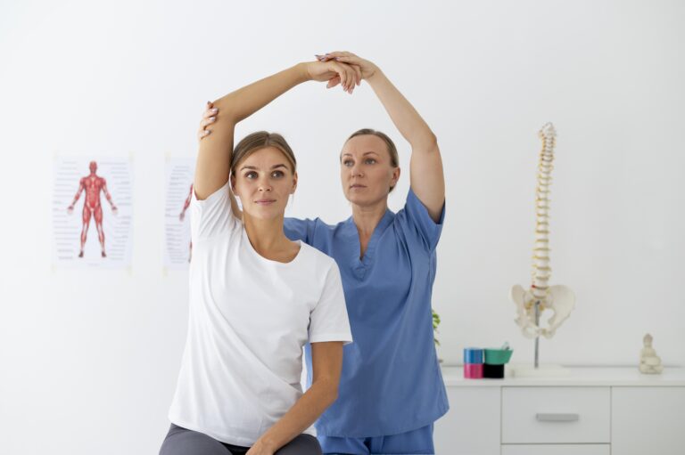 physiotherapist-helping-female-patient-her-clinic