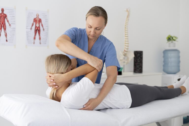 physiotherapist-helping-young-female-patient (1)